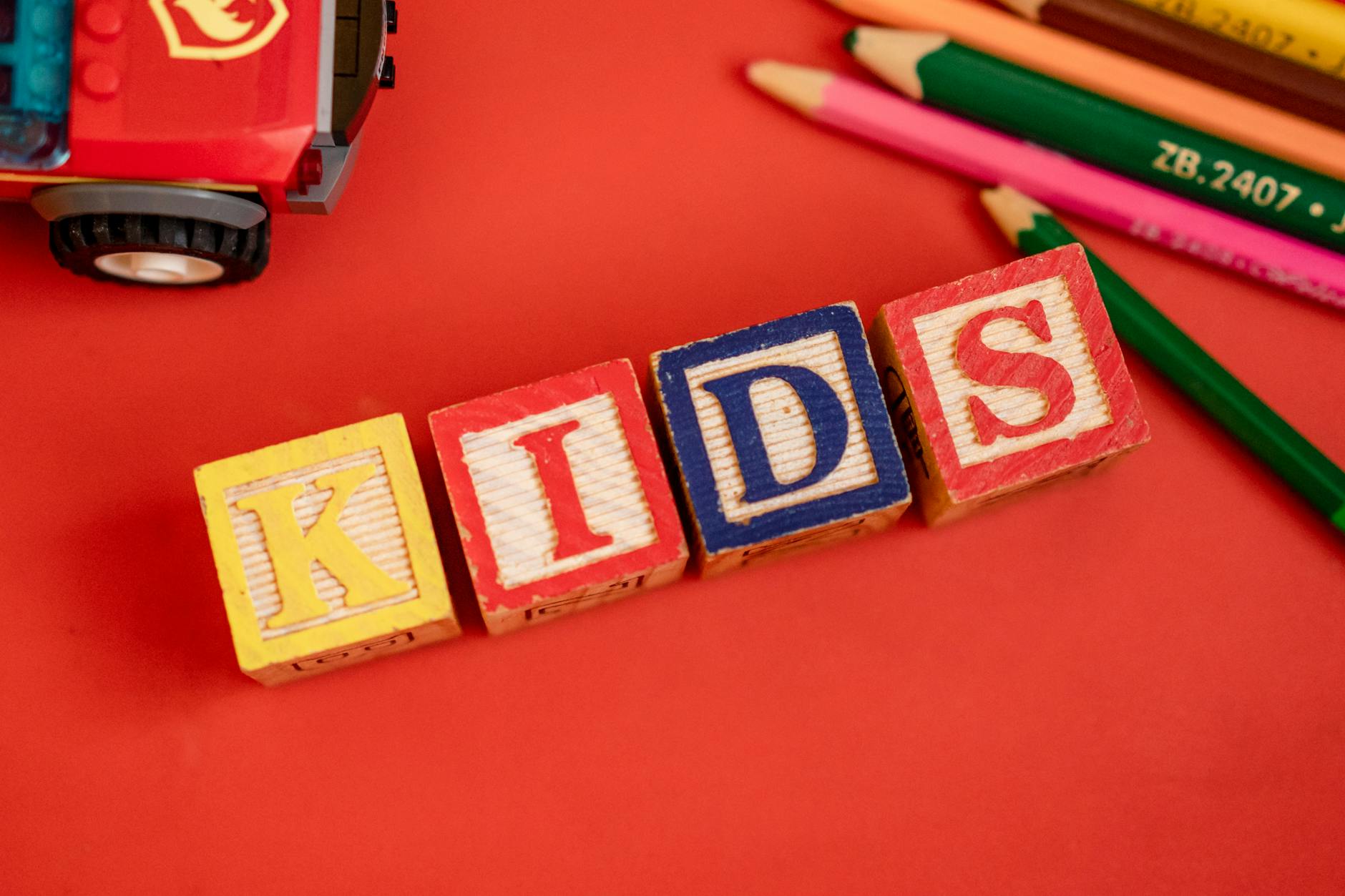 Children playing in a hotel kids club with toys and craft activities
