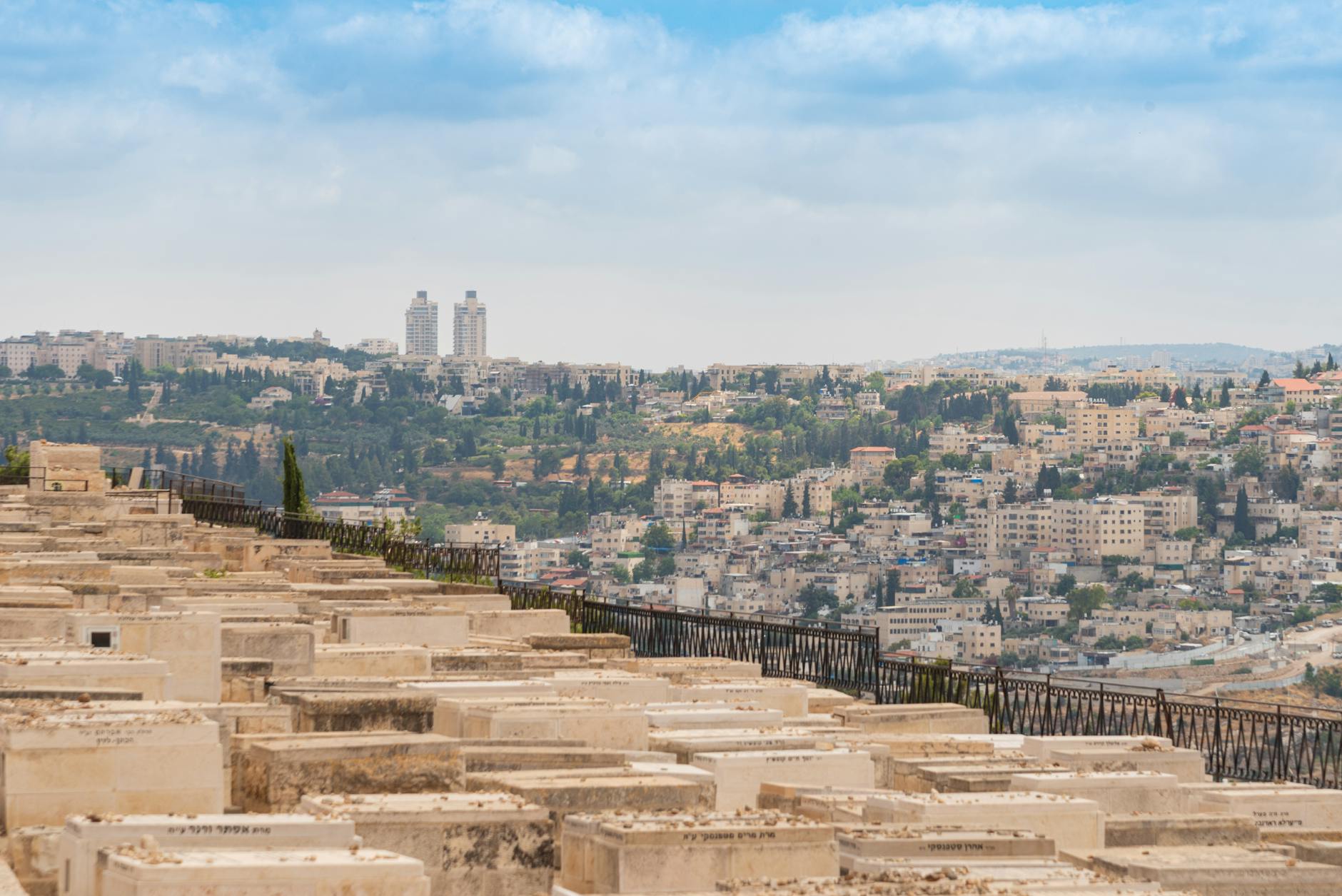 Sunset view over Jerusalem from a hilltop promenade, free panoramic vantage point