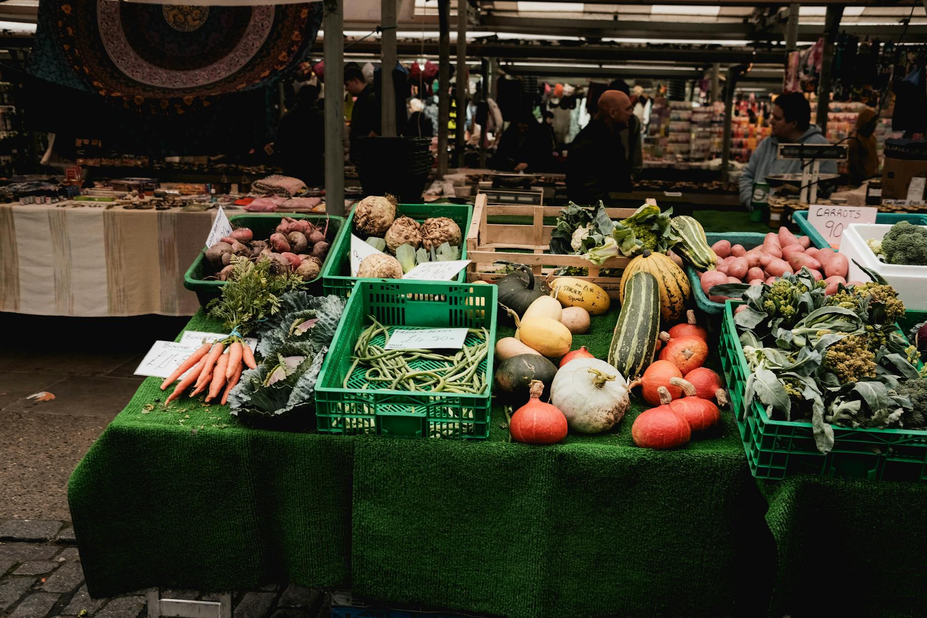 Vibrant fresh produce stall with colorful vegetables and fruits at Jerusalem market