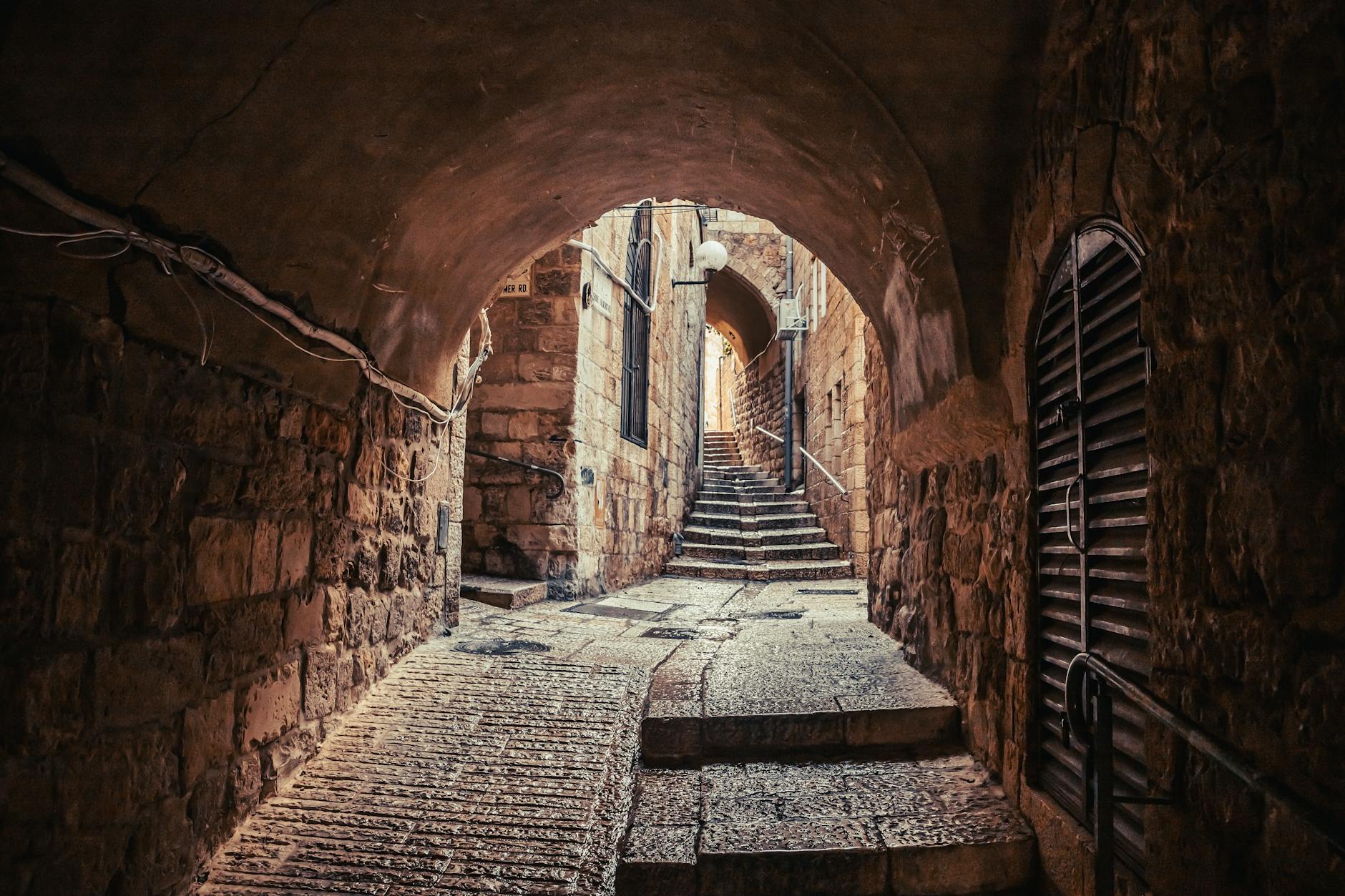 Quiet Armenian Quarter street with stone walls in Jerusalem Old City