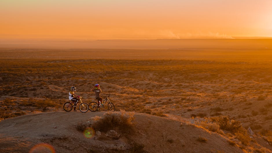 Mountain biker Judean desert dramatic landscape