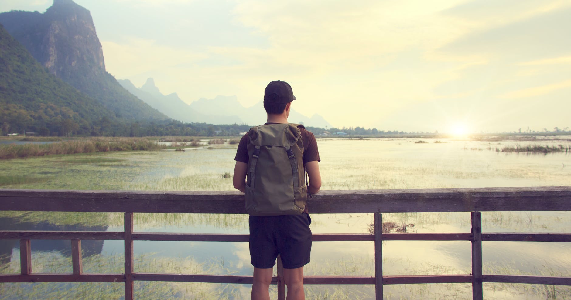 Backpacker enjoying free panoramic Jerusalem view from a public viewpoint