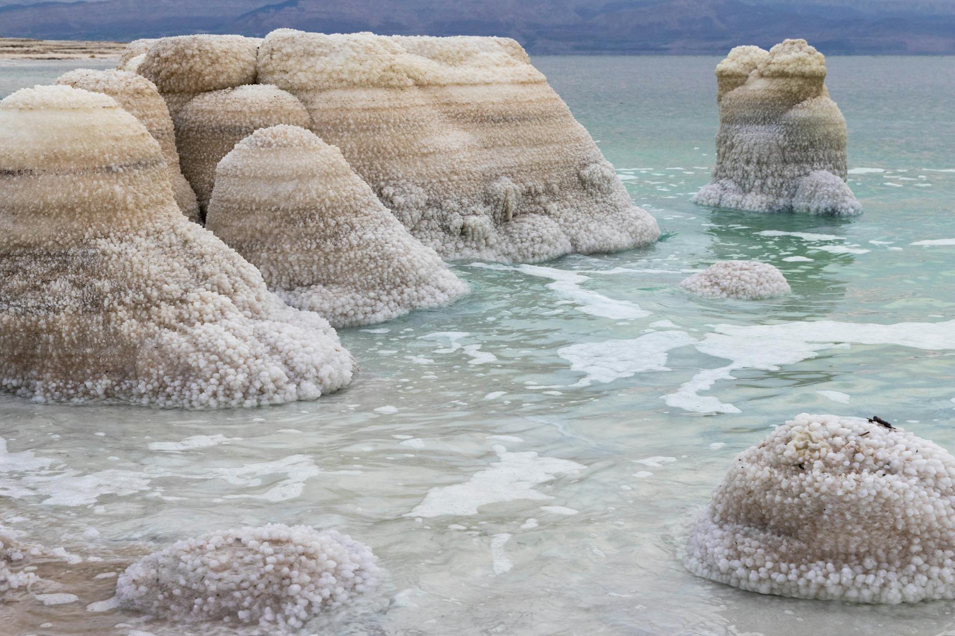 Floating in the Dead Sea with mineral mud and salt water