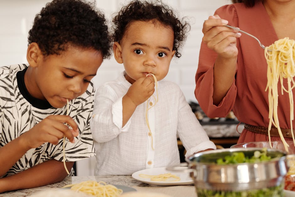 Children eating pasta restaurant Jerusalem family meal