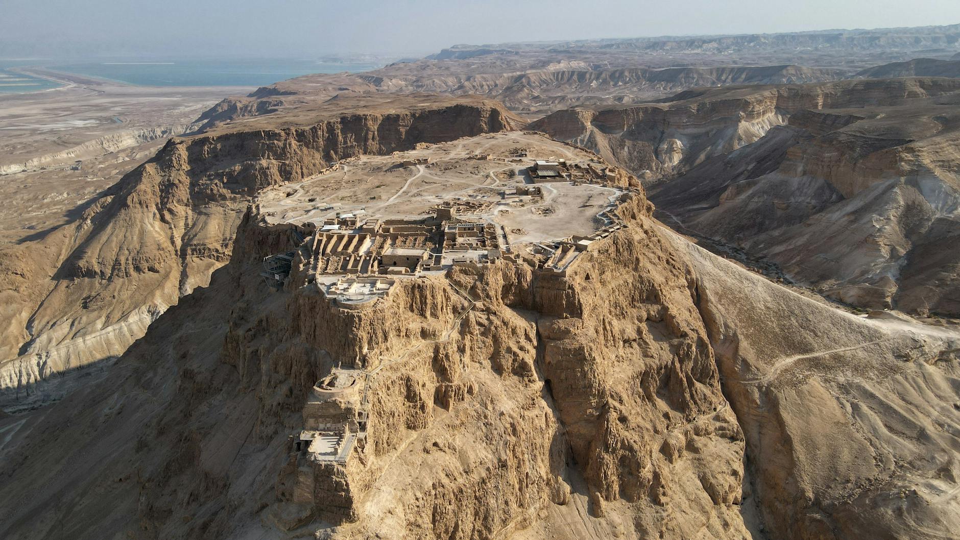 Sunrise hike on Masada Snake Path with desert landscape