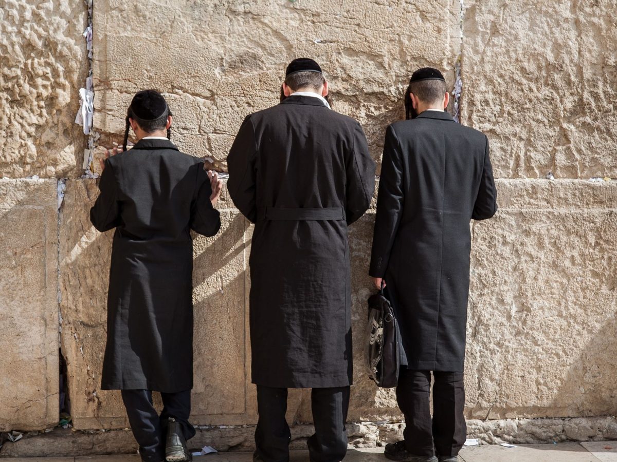 Worshippers praying at the Western Wall in Jerusalem, free to visit year-round