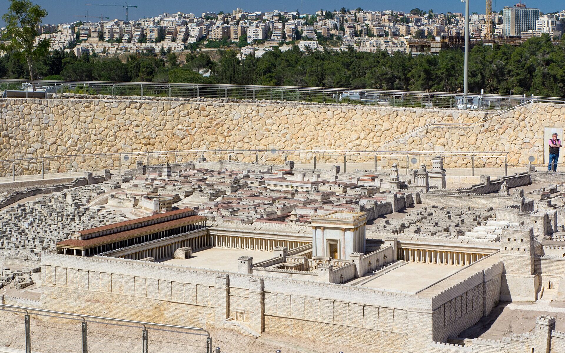 The Second Temple and its courts on the 1:50 model of ancient Jerusalem at the Israel Museum, with modern Jerusalem housing on the hills behind